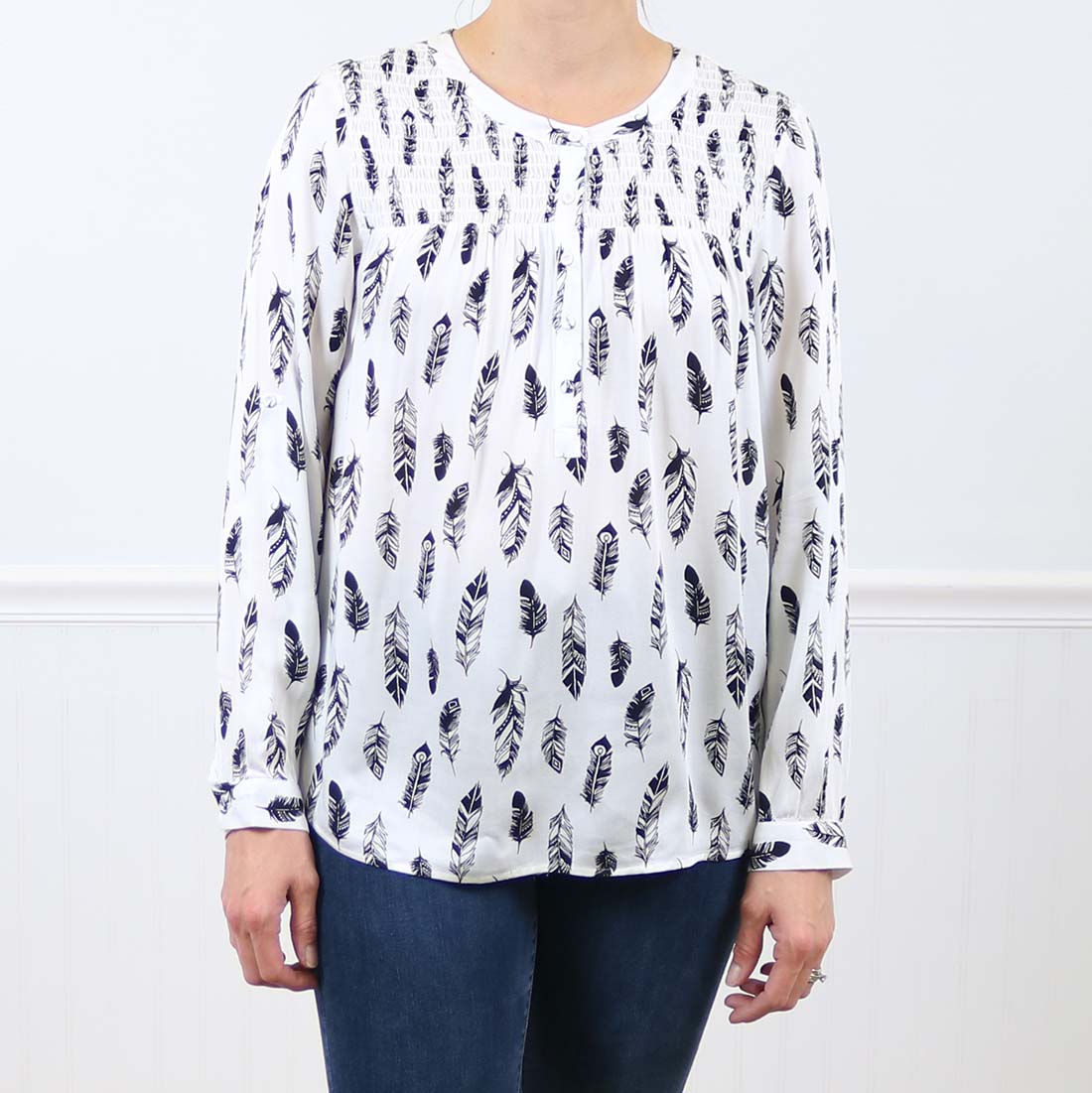 white shirt with feathers